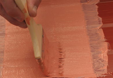 Reinforcing stitchbond roofing fabric