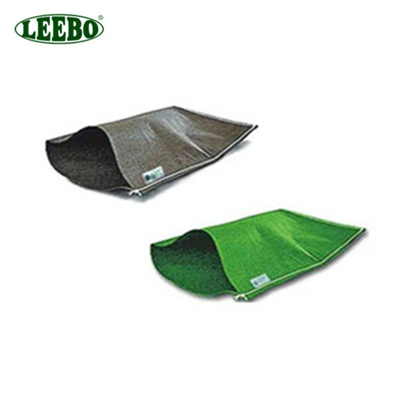 green woven geotextile sand bag retaining wall