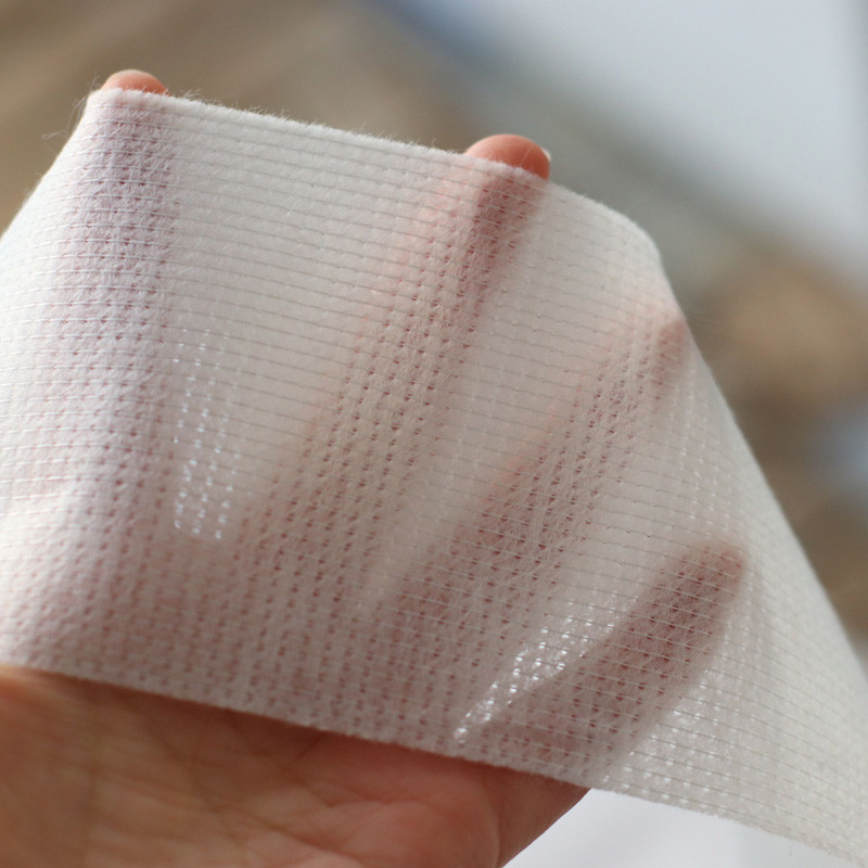 Roof coating reinforcing stitch bond nonwoven polyester roofing fabric